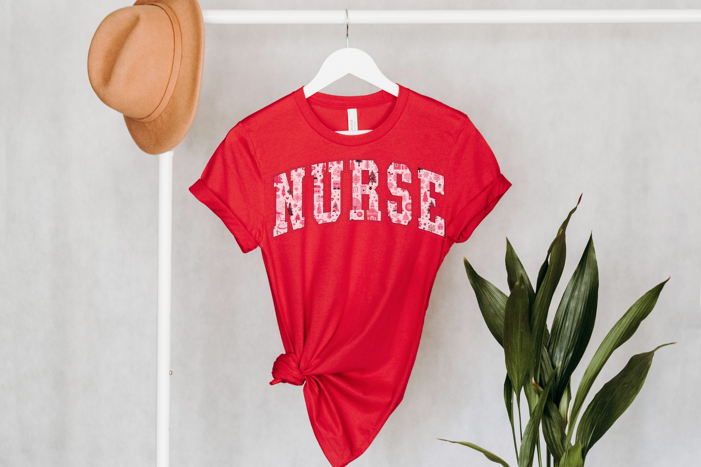 Christmas Pink Nurse Varsity Graphic Tee