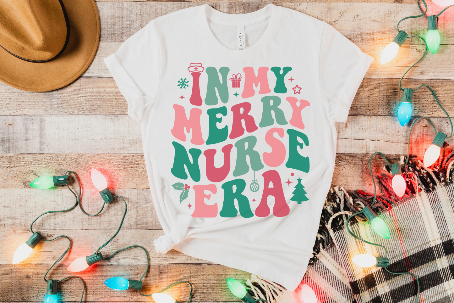 Christmas In My Merry Nurse Era Graphic Tee