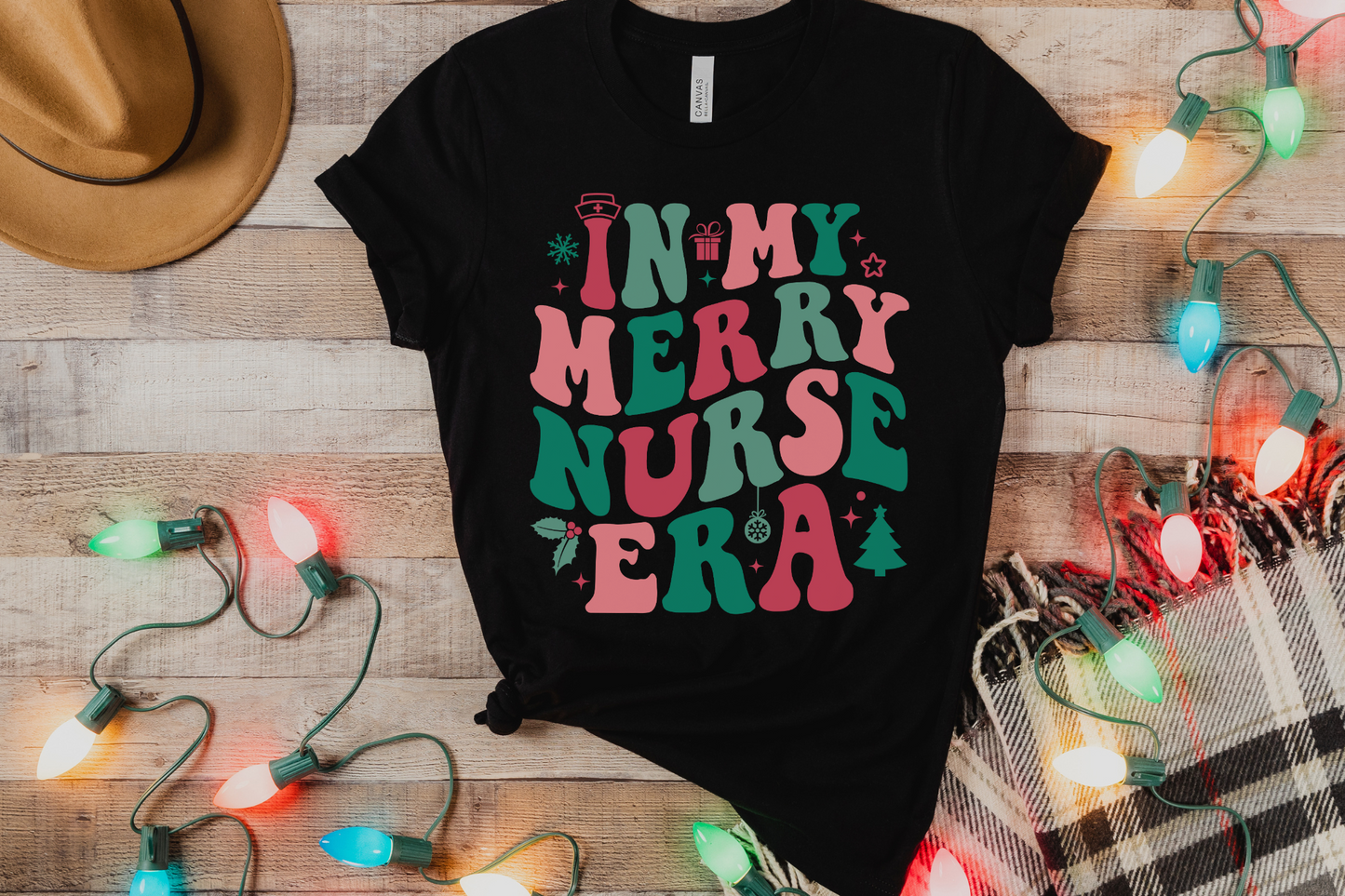 Christmas In My Merry Nurse Era Graphic Tee