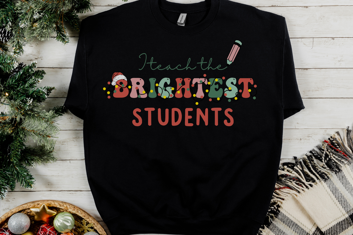 Christmas Teach the Brightest Students Sweatshirt