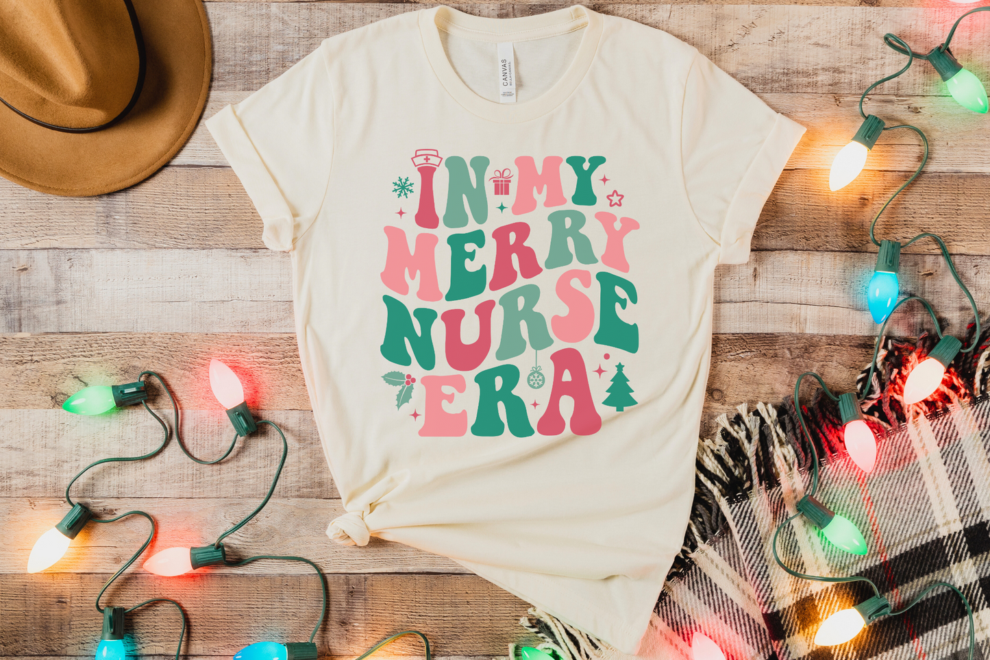 Christmas In My Merry Nurse Era Graphic Tee