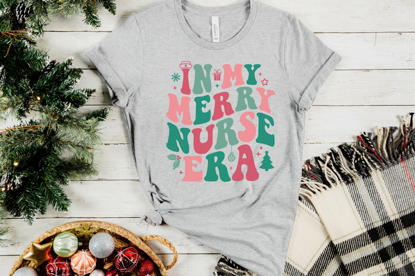 Christmas In My Merry Nurse Era Graphic Tee