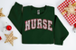 Christmas Pink Varsity Nurse Sweatshirt