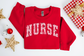 Christmas Pink Varsity Nurse Sweatshirt