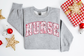 Christmas Pink Varsity Nurse Sweatshirt